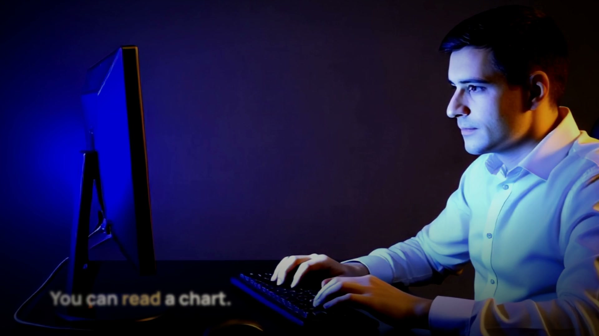 A trader at his screen before dawn, from the film